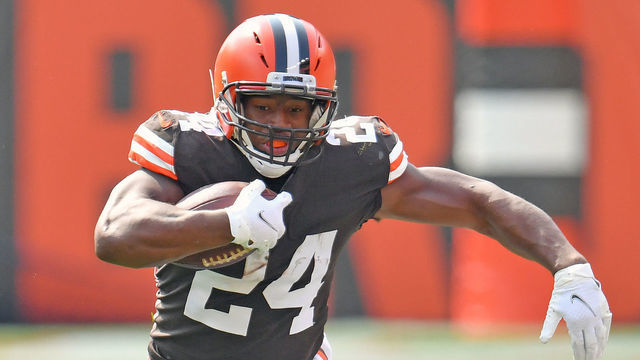 CLEVELAND, OHIO - SEPTEMBER 27: Running back Nick Chubb #24 of the Cleveland Browns breaks a tackle from strong safety Landon Collins #26 of the Washington Football Team as he runs for a first down at FirstEnergy Stadium on September 27, 2020 in Cleveland, Ohio.