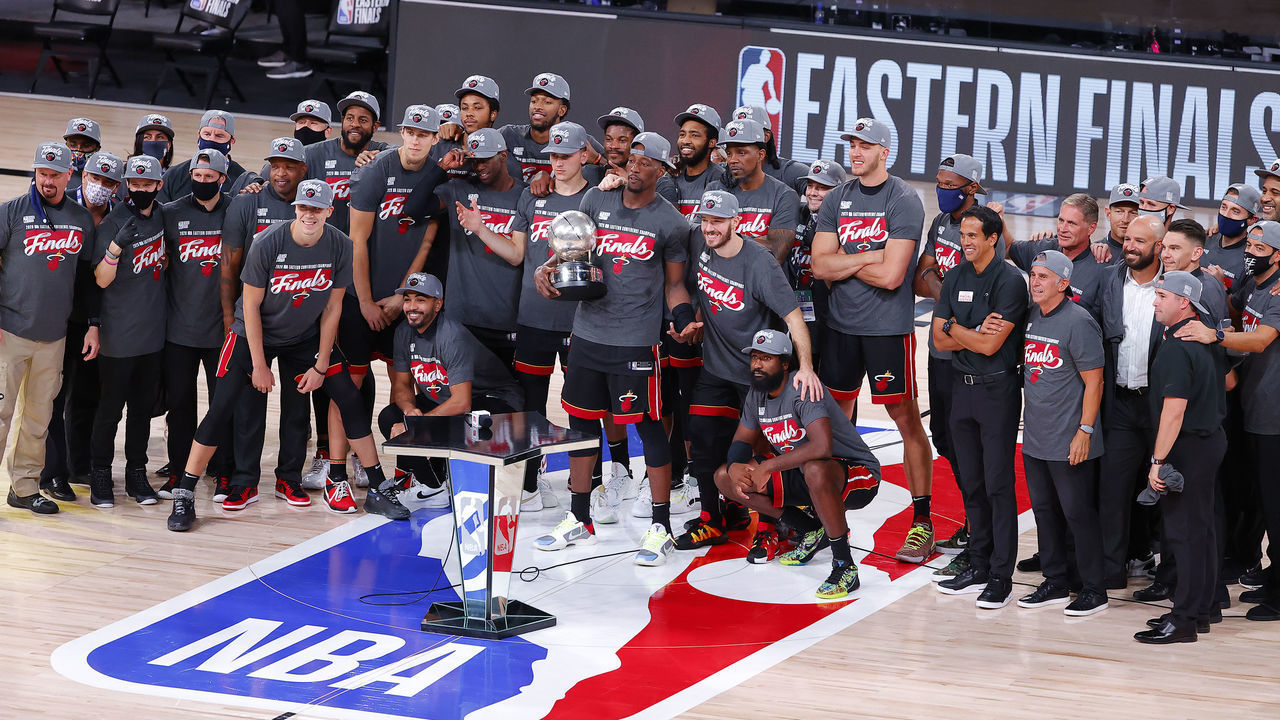 LAKE BUENA VISTA, FLORIDA - SEPTEMBER 27: The Miami Heat celebrate with the trophy after they are Eastern Finals Champions against the Boston Celtics in Game Six of the Eastern Conference Finals during the 2020 NBA Playoffs at AdventHealth Arena at the ESPN Wide World Of Sports Complex on September 27, 2020 in Lake Buena Vista, Florida.