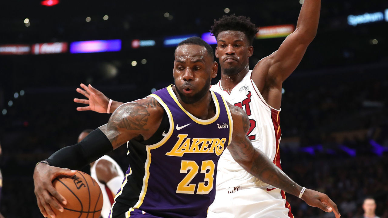 LOS ANGELES, CALIFORNIA - NOVEMBER 08: Jimmy Butler #22 of the Miami Heat defends against LeBron James #23 of the Los Angeles Lakers during the second half of a game at Staples Center on November 08, 2019 in Los Angeles, California. NOTE TO USER: User expressly acknowledges and agrees that, by downloading and/or using this photograph, user is consenting to the terms and conditions of the Getty Images License Agreement