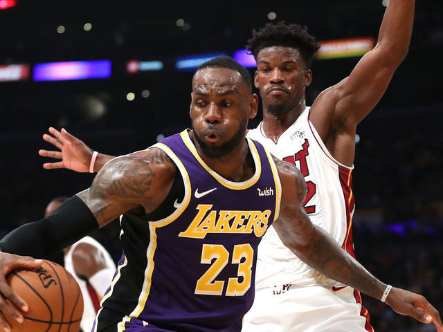 LOS ANGELES, CALIFORNIA - NOVEMBER 08: Jimmy Butler #22 of the Miami Heat defends against LeBron James #23 of the Los Angeles Lakers during the second half of a game at Staples Center on November 08, 2019 in Los Angeles, California. NOTE TO USER: User expressly acknowledges and agrees that, by downloading and/or using this photograph, user is consenting to the terms and conditions of the Getty Images License Agreement