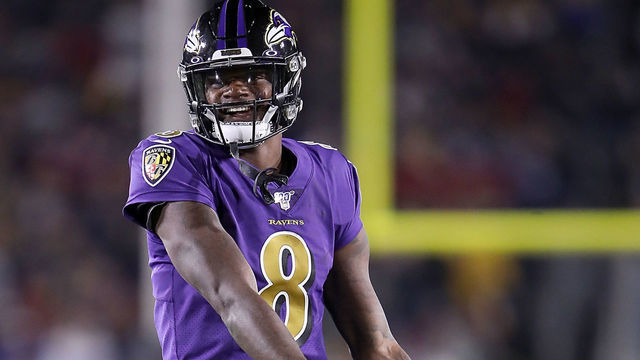 LOS ANGELES, CALIFORNIA - NOVEMBER 25: Quarterback Lamar Jackson #8 of the Baltimore Ravens celebrates his second pass for a touchdown to wide receiver Marquise Brown #15 in the first quarter of the game against the Los Angeles Rams at Los Angeles Memorial Coliseum on November 25, 2019 in Los Angeles, California.