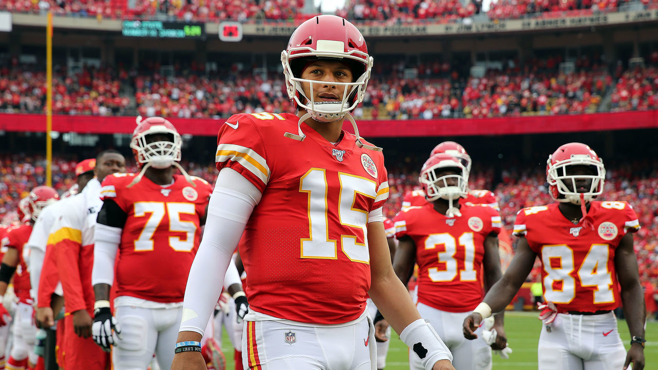 KANSAS CITY, MISSOURI - SEPTEMBER 22: Quarterback Patrick Mahomes #15 of the Kansas City Chiefs waits on the field to greet players during pre-game introductions prior to the game against the Baltimore Ravens at Arrowhead Stadium on September 22, 2019 in Kansas City, Missouri.