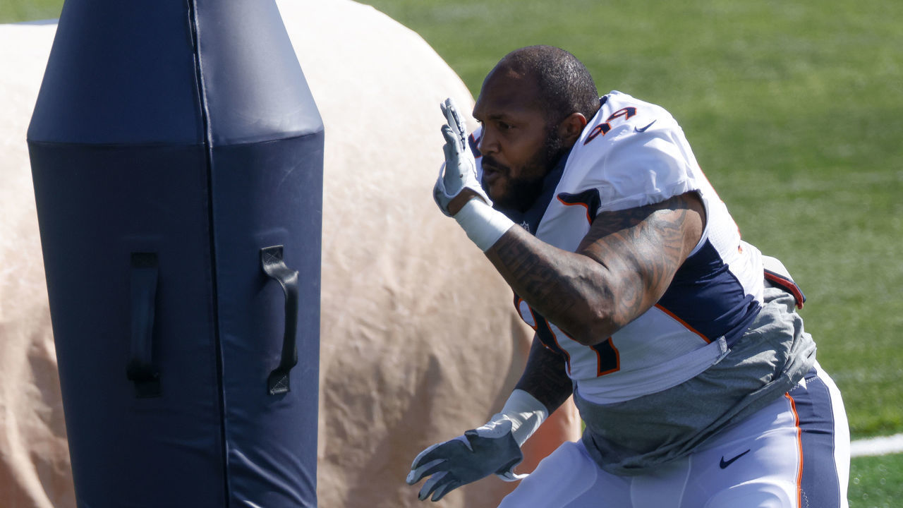 ENGLEWOOD, CO - AUGUST 17: Defensive tackle Jurrell Casey #99 of the Denver Broncos uses a piece of equipment during a training session at UCHealth Training Center on August 17, 2020 in Englewood, Colorado.