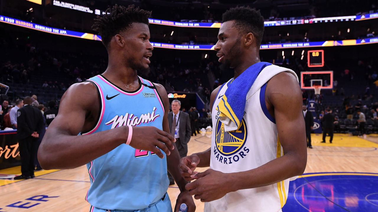 SAN FRANCISCO, CA - FEBRUARY 10: Jimmy Butler #22 of the Miami Heat talks with Andrew Wiggins #22 of the Golden State Warriors after the game on February 10, 2020 at Chase Center in San Francisco, California. NOTE TO USER: User expressly acknowledges and agrees that, by downloading and or using this photograph, user is consenting to the terms and conditions of Getty Images License Agreement. Mandatory Copyright Notice: Copyright 2020 NBAE