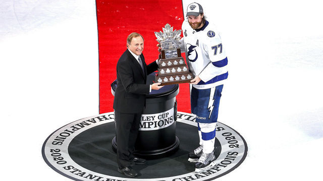 EDMONTON, ALBERTA - SEPTEMBER 28: NHL commissioner Gary Bettman presents Victor Hedman #77 of the Tampa Bay Lightning with the Conn Smythe Trophy for playoff MVP following the Lightning’s series-winning victory over the Dallas Stars in Game Six of the 2020 NHL Stanley Cup Final at Rogers Place on September 28, 2020 in Edmonton, Alberta, Canada.