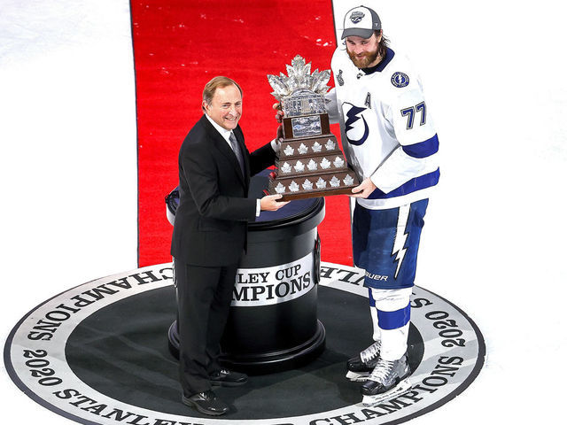 EDMONTON, ALBERTA - SEPTEMBER 28: NHL commissioner Gary Bettman presents Victor Hedman #77 of the Tampa Bay Lightning with the Conn Smythe Trophy for playoff MVP following the Lightning’s series-winning victory over the Dallas Stars in Game Six of the 2020 NHL Stanley Cup Final at Rogers Place on September 28, 2020 in Edmonton, Alberta, Canada.