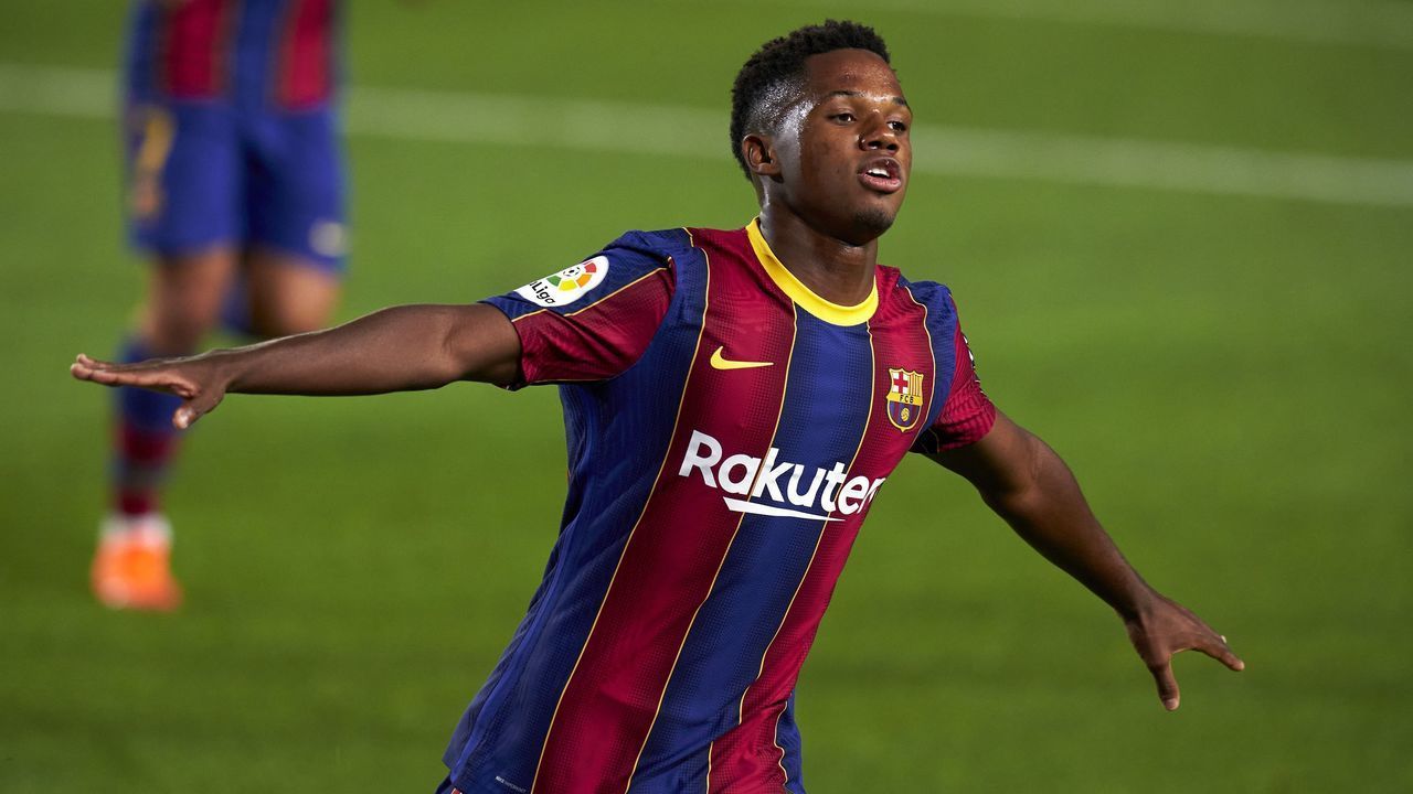BARCELONA, SPAIN - SEPTEMBER 27: Anssumane Fati of Barcelona celebrates after scoring his team's second goal during the La Liga Santander match between FC Barcelona and Villarreal CF at Camp Nou on September 27, 2020 in Barcelona, Spain. Football Stadiums around Europe remain empty due to the Coronavirus Pandemic as Government social distancing laws prohibit fans inside venues resulting in fixtures being played behind closed doors.