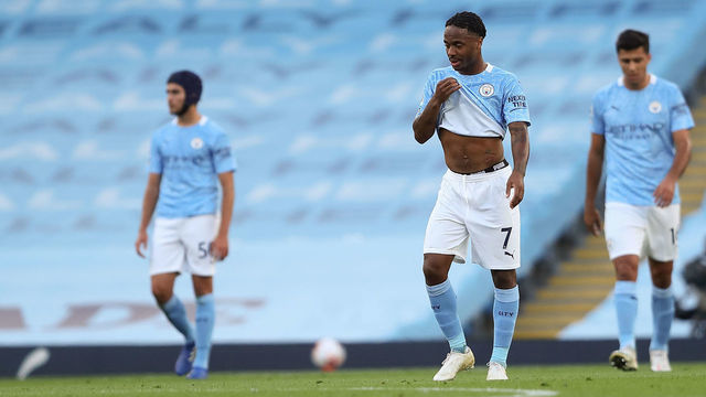 MANCHESTER, ENGLAND - SEPTEMBER 27: A dejected Raheem Sterling of Manchester City after Jamie Vardy of Leicester City scored a goal from the penalty spot to make it 1-1 during the Premier League match between Manchester City and Leicester City at Etihad Stadium on September 27, 2020 in Manchester, United Kingdom. Sporting stadiums around the UK remain under strict restrictions due to the Coronavirus Pandemic as Government social distancing laws prohibit fans inside venues resulting in games being played behind closed doors.