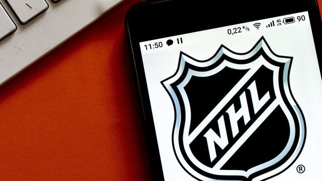UKRAINE - 2020/09/21: In this photo illustration an NHL logo seen displayed on a smartphone. (Photo Illustration by Igor Golovniov/SOPA Images/LightRocket via Getty Images)