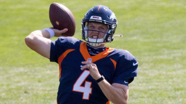 ENGLEWOOD, CO - AUGUST 17: Quarterback Brett Rypien #4 of the Denver Broncos throws a pass during a training session at UCHealth Training Center on August 17, 2020 in Englewood, Colorado.