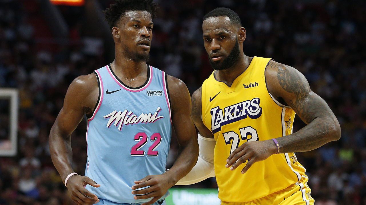 MIAMI, FLORIDA - DECEMBER 13: LeBron James #23 of the Los Angeles Lakers guards Jimmy Butler #22 of the Miami Heat during the second half at American Airlines Arena on December 13, 2019 in Miami, Florida. NOTE TO USER: User expressly acknowledges and agrees that, by downloading and/or using this photograph, user is consenting to the terms and conditions of the Getty Images License Agreement