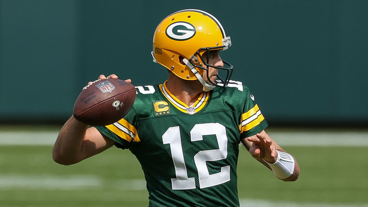 GREEN BAY, WISCONSIN - SEPTEMBER 20: Aaron Rodgers #12 of the Green Bay Packers throws a pass in the first quarter against the Detroit Lions at Lambeau Field on September 20, 2020 in Green Bay, Wisconsin.