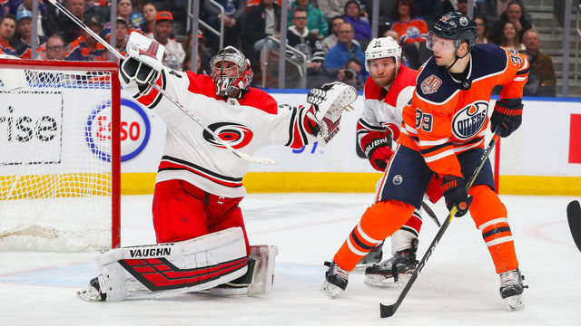 EDMONTON, AB - JANUARY 20: Carolina Hurricanes Goalie Petr Mrazek (34) makes a great save in the third period during the Edmonton Oilers game versus the Carolina Hurricanes on January 20, 2019 at Rogers Place in Edmonton, AB.