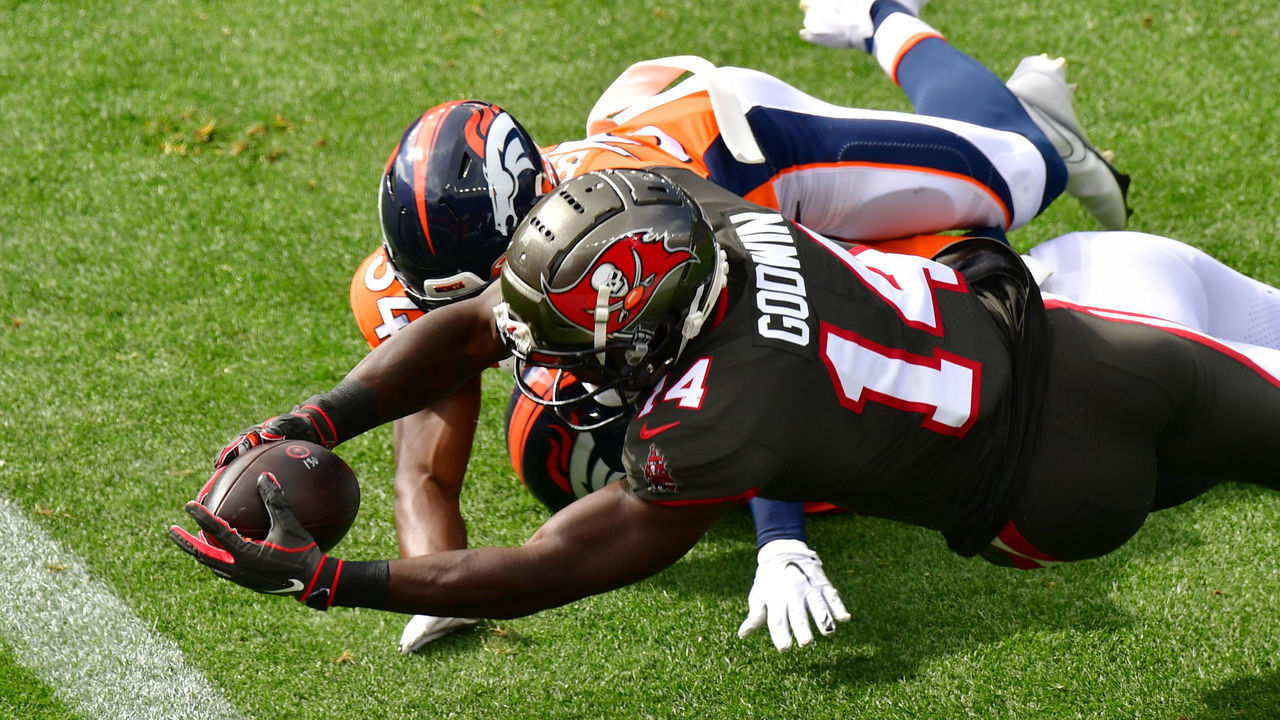 DENVER, CO - SEPTEMBER 27 : Tampa Bay Buccaneers Chris Godwin (14) dives for the touch down in the 1st quarter of the game against Denver Broncos at Empower Field at Mile High in Denver, Colorado on Sunday. September 27, 2020.