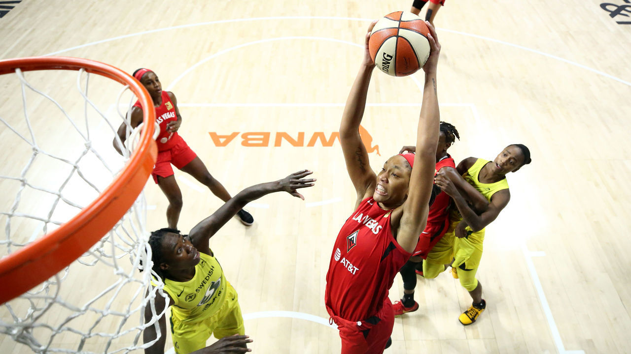 PALMETTO, FL - SEPTEMBER 13: A'ja Wilson #22 of the Las Vegas Aces grabs the rebound against the Seattle Storm on September 13, 2020 at Feld Entertainment Center in Palmetto, Florida. NOTE TO USER: User expressly acknowledges and agrees that, by downloading and/or using this Photograph, user is consenting to the terms and conditions of the Getty Images License Agreement. Mandatory Copyright Notice: Copyright 2020 NBAE