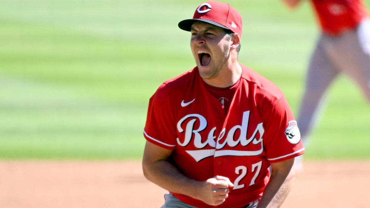 ATLANTA, GA - SEPTEMBER 30: Trevor Bauer #27 of the Cincinnati Reds celebrates after the final out of sixth inning during Game 1 of the Wild Card Series between the Cincinnati Reds and the Atlanta Braves at Truist Park on Wednesday, September 30, 2020 in Atlanta, Georgia.