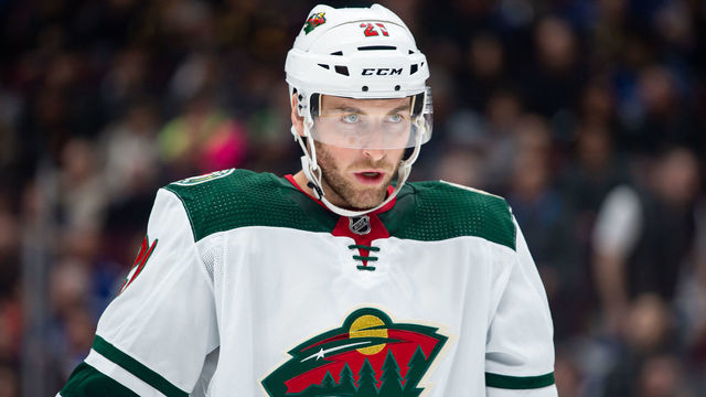 VANCOUVER, BC - FEBRUARY 19: Minnesota Wild Defenceman Carson Soucy (21) waits for a face-off during their NHL game against the Vancouver Canucks at Rogers Arena on February 19, 2020 in Vancouver, British Columbia, Canada.
