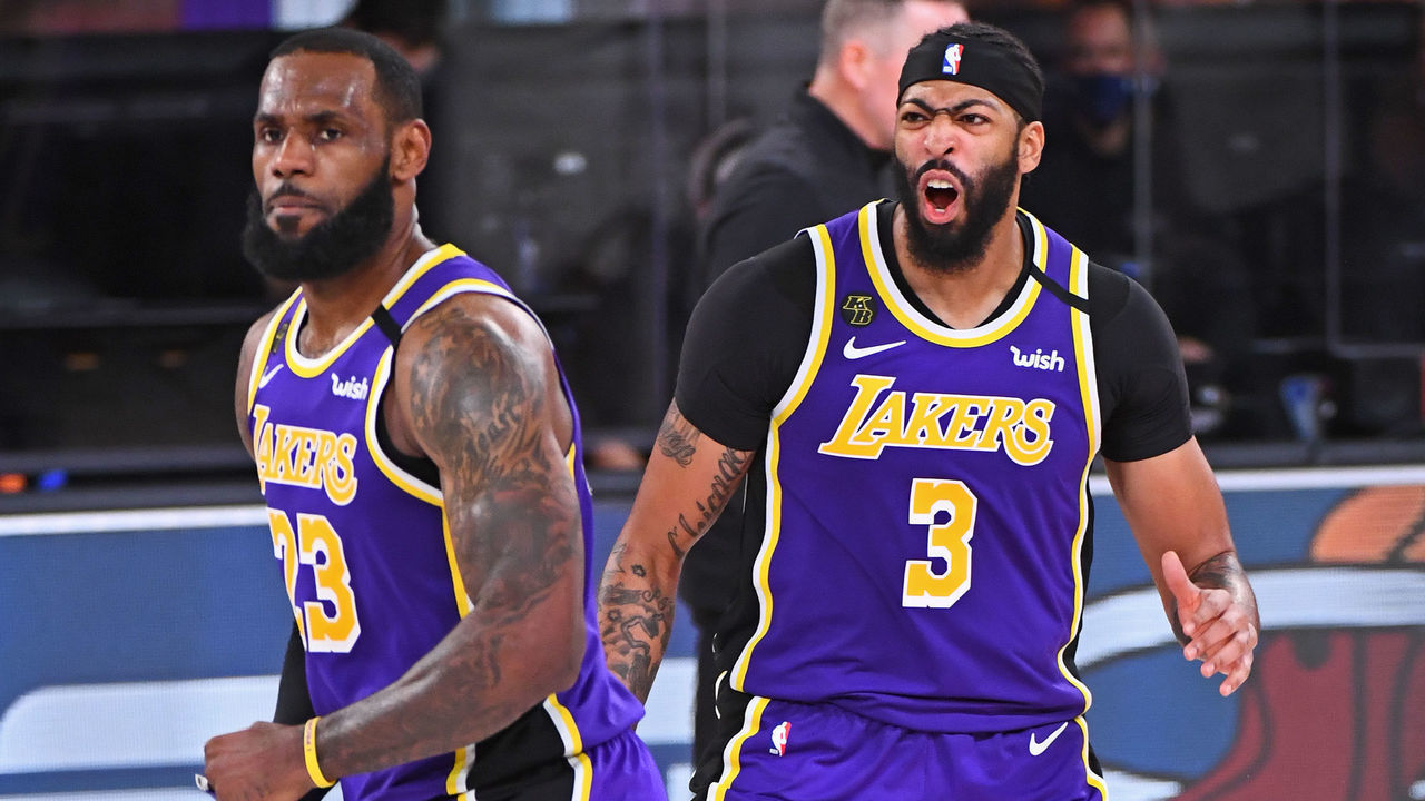 ORLANDO, FL - SEPTEMBER 26: LeBron James #23 and Anthony Davis #3 of the Los Angeles Lakers celebrate during the game against the Denver Nuggets during Game Five of the Western Conference Finals of the NBA Playoffs on September 26, 2020 at The AdventHealth Arena at ESPN Wide World Of Sports Complex in Orlando, Florida. NOTE TO USER: User expressly acknowledges and agrees that, by downloading and/or using this Photograph, user is consenting to the terms and conditions of the Getty Images License Agreement. Mandatory Copyright Notice: Copyright 2020 NBAE