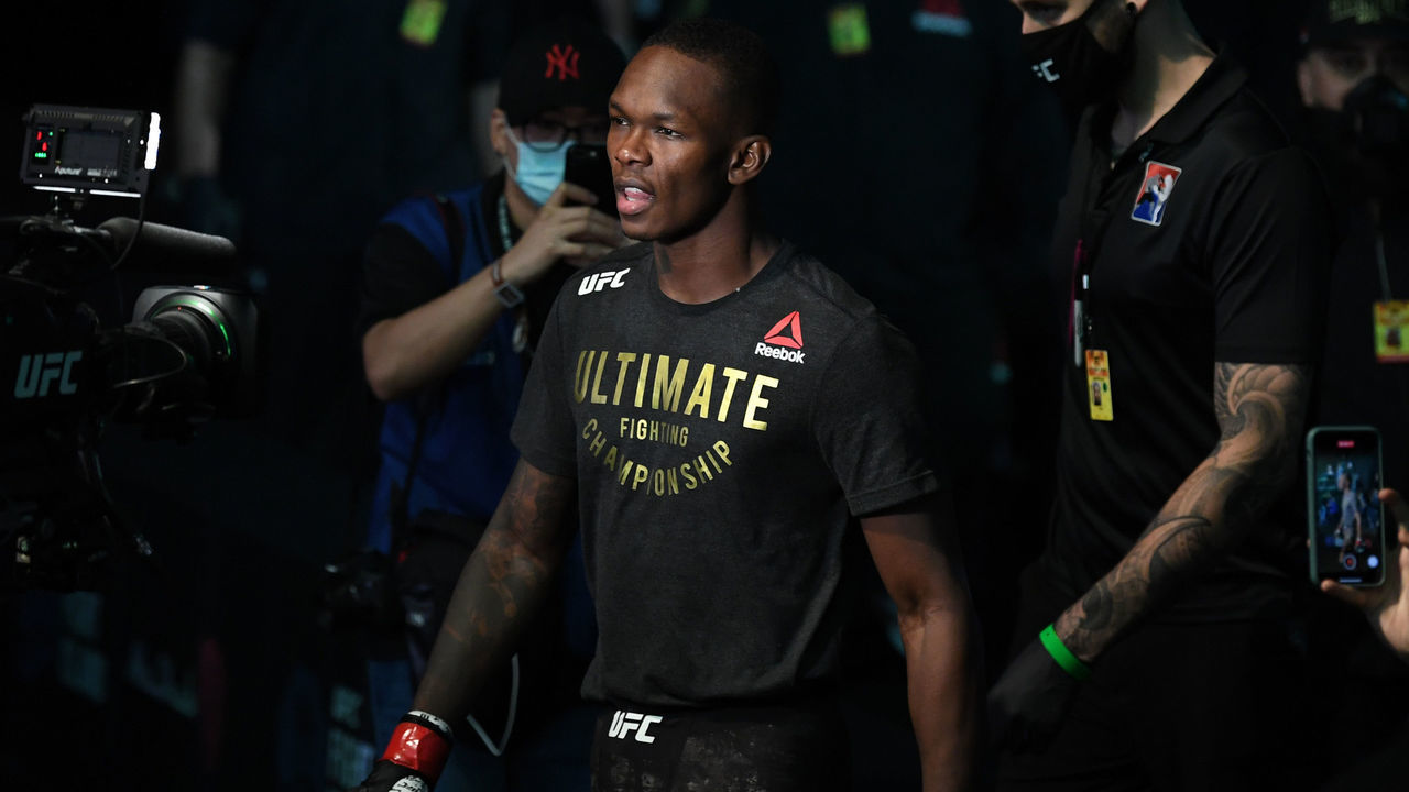 ABU DHABI, UNITED ARAB EMIRATES - SEPTEMBER 27: Israel Adesanya of Nigeria walks out towards the Octagon prior to facing Paulo Costa of Brazil in their middleweight championship bout during UFC 253 inside Flash Forum on UFC Fight Island on September 27, 2020 in Abu Dhabi, United Arab Emirates.