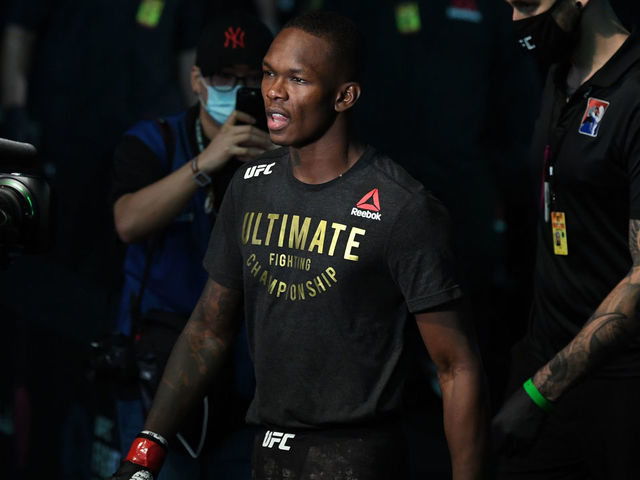 ABU DHABI, UNITED ARAB EMIRATES - SEPTEMBER 27: Israel Adesanya of Nigeria walks out towards the Octagon prior to facing Paulo Costa of Brazil in their middleweight championship bout during UFC 253 inside Flash Forum on UFC Fight Island on September 27, 2020 in Abu Dhabi, United Arab Emirates.