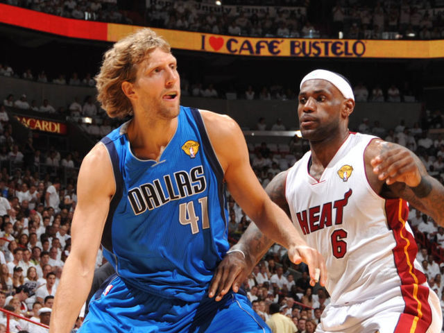 MIAMI, FL - JUNE 2: Dirk Nowitzki #41 of the Dallas Mavericks drives against LeBron James #6 of the Miami Heat in Game Two of the 2011 NBA Finals on June 2, 2011 at the American Airlines Arena in Miami, Florida. NOTE TO USER: User expressly acknowledges and agrees that, by downloading and/or using this photograph, user is consenting to the terms and conditions of the Getty Images License Agreement. Mandatory Copyright Notice: Copyright 2011 NBAE