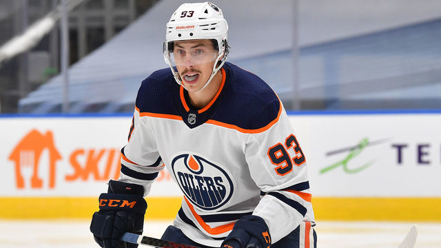 EDMONTON, ALBERTA - JULY 28: Ryan Nugent-Hopkins #93 of the Edmonton Oilers skates during the second period of an exhibition game against the Calgary Flames prior to the 2020 NHL Stanley Cup Playoffs at Rogers Place on July 28, 2020 in Edmonton, Alberta.