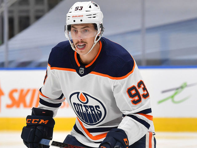 EDMONTON, ALBERTA - JULY 28: Ryan Nugent-Hopkins #93 of the Edmonton Oilers skates during the second period of an exhibition game against the Calgary Flames prior to the 2020 NHL Stanley Cup Playoffs at Rogers Place on July 28, 2020 in Edmonton, Alberta.