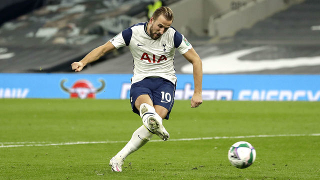 Tottenham Hotspur's Harry Kane scores his side's fifth goal of the penalty shoot-out during the Carabao Cup fourth round match at the Tottenham Hotspur Stadium, London.