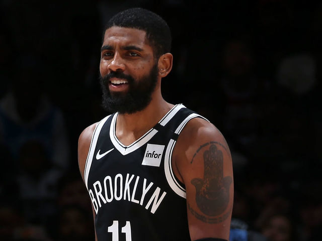 WASHINGTON, DC - FEBRUARY 1: Kyrie Irving #11 of the Brooklyn Nets smiles during the game against the Washington Wizards on February 1, 2020 at Capital One Arena in Washington, DC. Mandatory Copyright Notice: Copyright 2020 NBAE