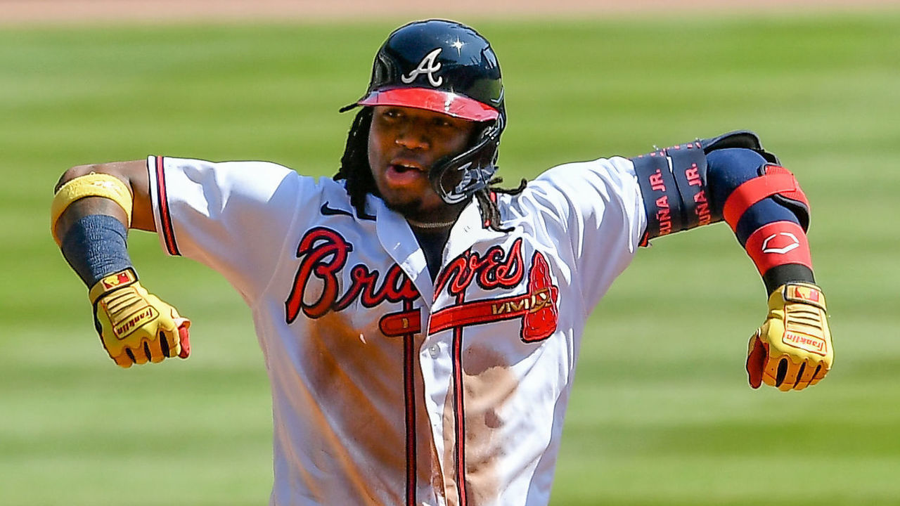 ATLANTA, GA OCTOBER 01: Atlanta Braves center fielder Ronald Acuna Jr. (13) reacts after hitting a double and driving in a run during the National League Wild Card Series game between the Cincinnati Reds and the Atlanta Braves on October 1st, 2020 at Truist Park in Atlanta, GA.