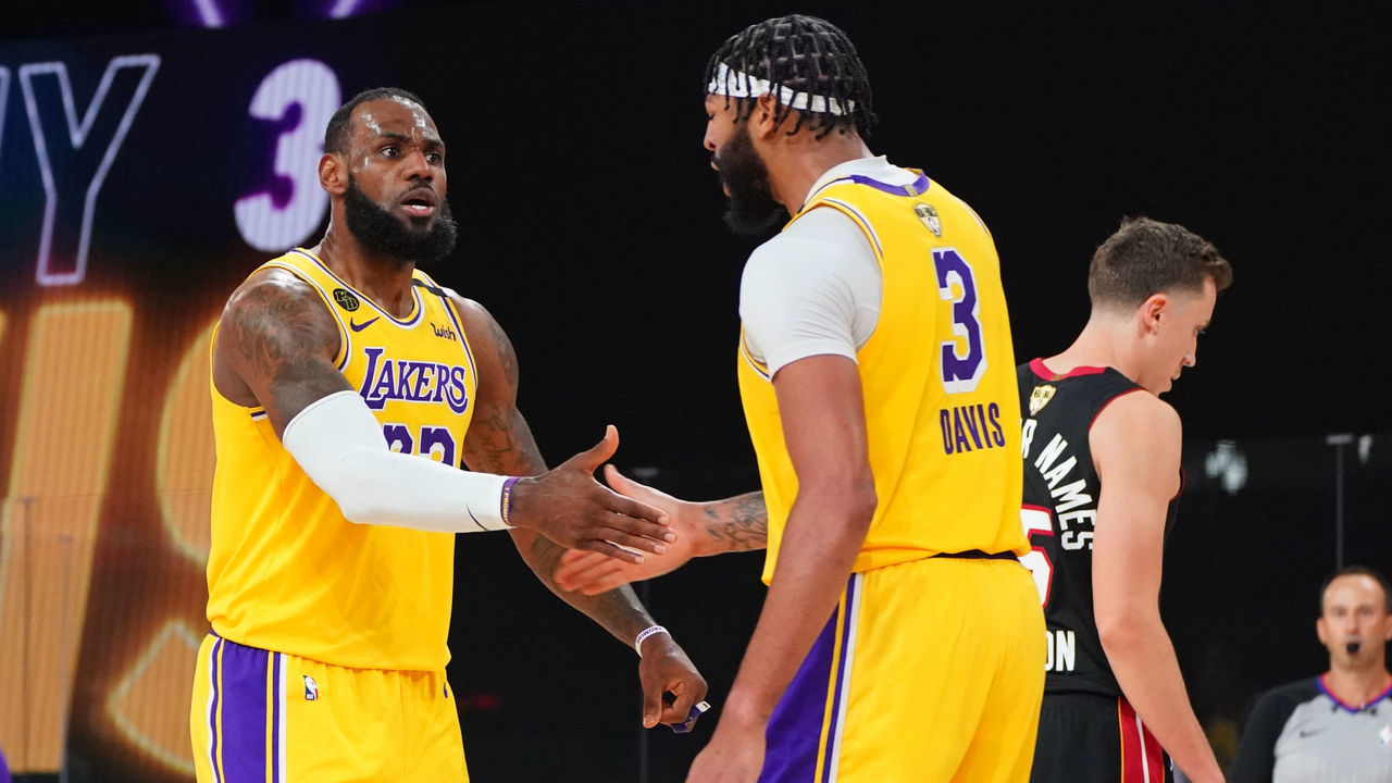 ORLANDO, FL - SEPTEMBER 30: LeBron James #23 of the Los Angeles Lakers and Anthony Davis #3 of the Los Angeles Lakers react during Game One of the NBA Finals on September 30, 2020 at the AdventHealth Arena at ESPN Wide World Of Sports Complex in Orlando, Florida. NOTE TO USER: User expressly acknowledges and agrees that, by downloading and/or using this Photograph, user is consenting to the terms and conditions of the Getty Images License Agreement. Mandatory Copyright Notice: Copyright 2020 NBAE
