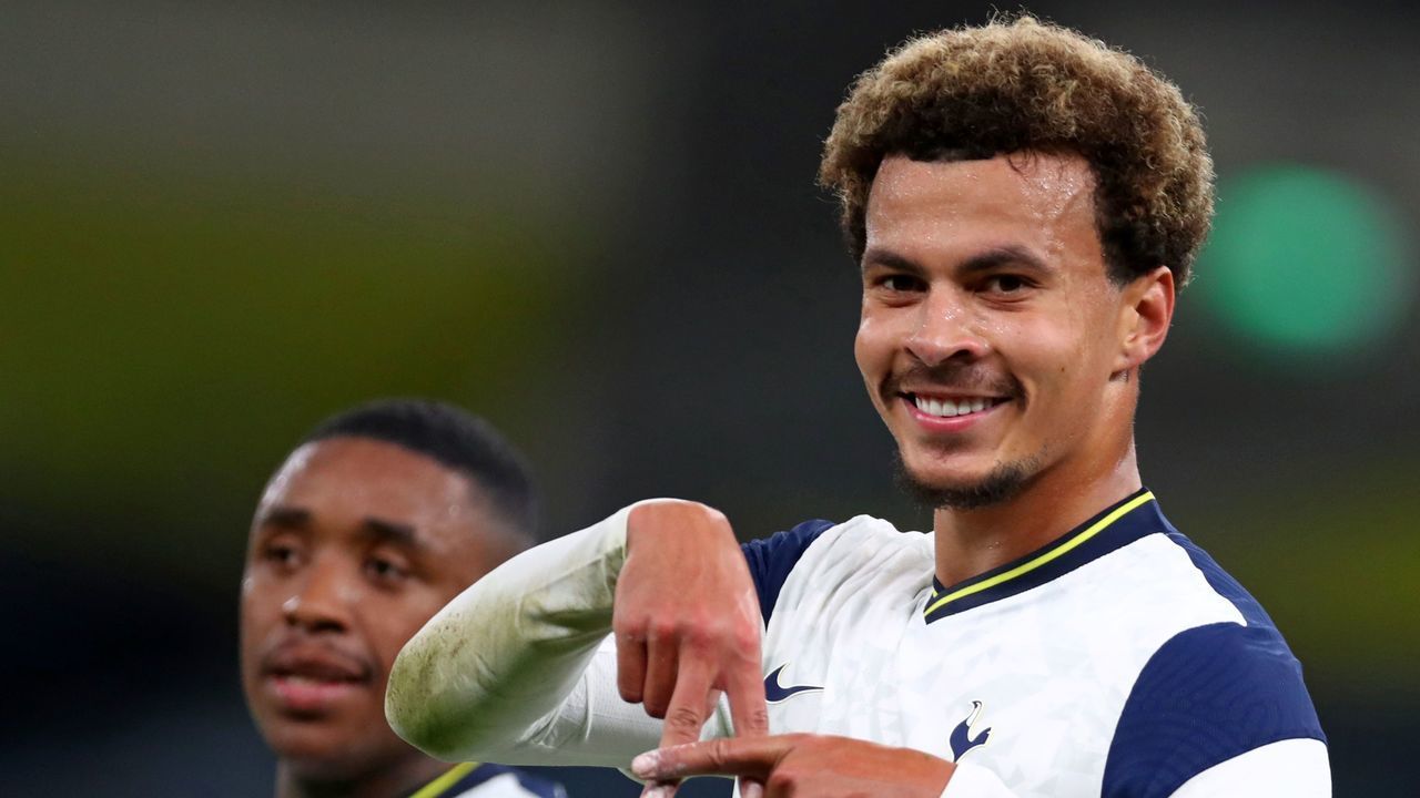Tottenham Hotspur's English midfielder Dele Alli gestures as he celebrates scoring his team's seventh goal from the penalty spot during the UEFA Europa League qualifying round football match between Tottenham Hotspur and Maccabi Haifa at the Tottenham Hotspur Stadium in London, on October 1, 2020.