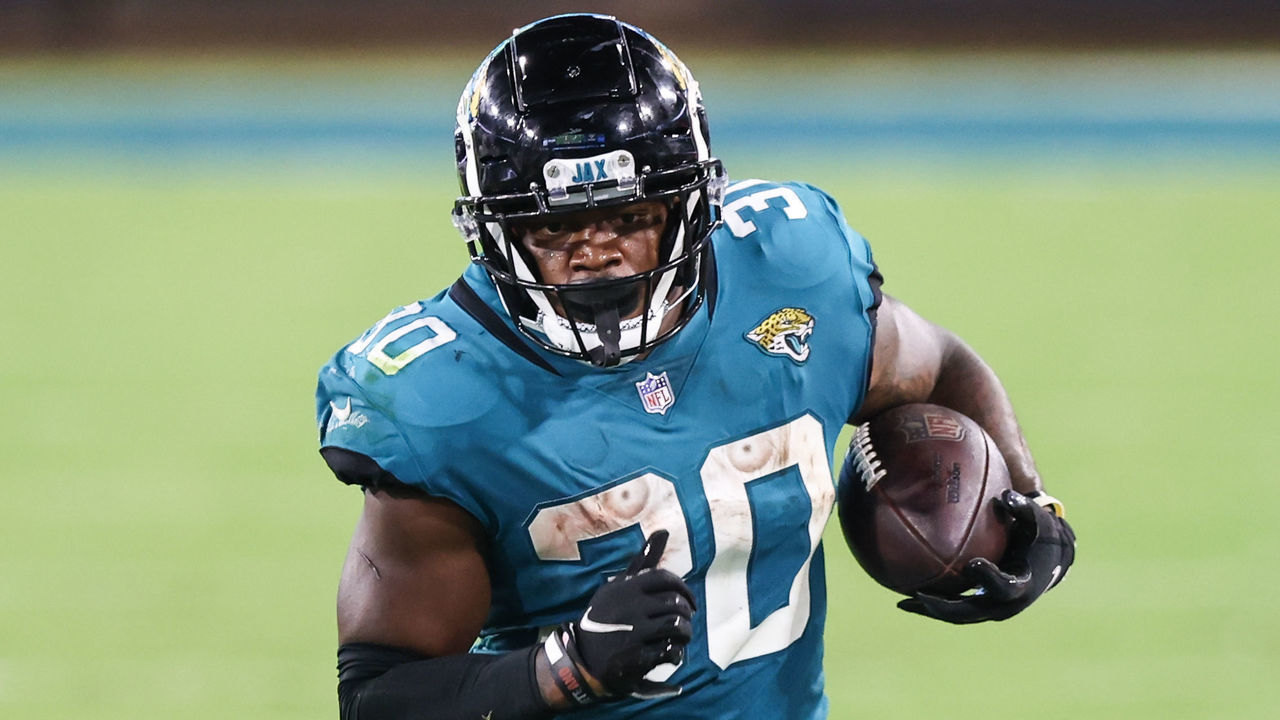 JACKSONVILLE, FLORIDA - SEPTEMBER 24: James Robinson #30 of the Jacksonville Jaguars runs for yardage during the third quarter of a game against the Miami Dolphins at TIAA Bank Field on September 24, 2020 in Jacksonville, Florida.