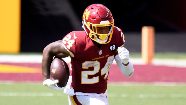 LANDOVER, MD - SEPTEMBER 13: Antonio Gibson #24 of the Washington Football Team runs with the ball against the Philadelphia Eagles at FedExField on September 13, 2020 in Landover, Maryland.