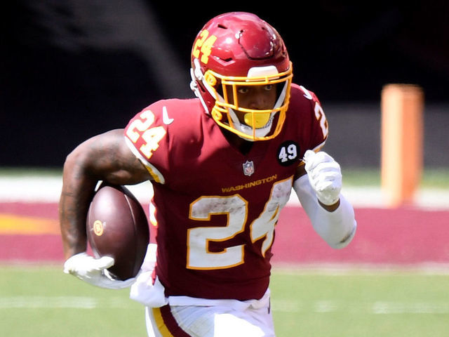 LANDOVER, MD - SEPTEMBER 13: Antonio Gibson #24 of the Washington Football Team runs with the ball against the Philadelphia Eagles at FedExField on September 13, 2020 in Landover, Maryland.