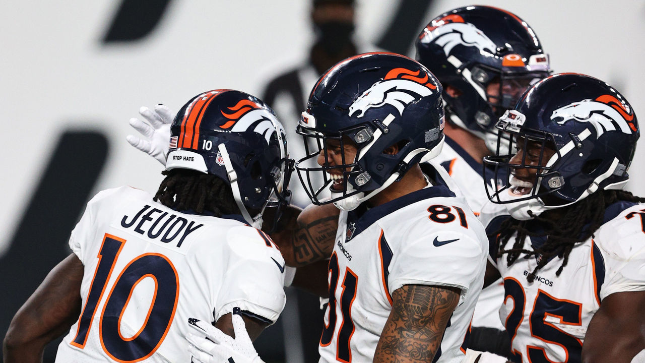 EAST RUTHERFORD, NEW JERSEY - OCTOBER 01: Jerry Jeudy #10 of the Denver Broncos celebrates a touchdown against the New York Jets with teammate Tim Patrick #81 and Melvin Gordon #25 during the second quarter at MetLife Stadium on October 01, 2020 in East Rutherford, New Jersey.