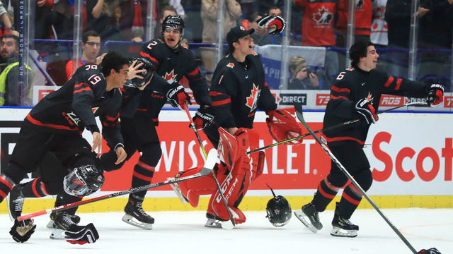 OSTRAVA, CZECH REPUBLIC - JANUARY 5, 2020: Canada's Quinton Byfield, Kevin Bahl, Nicolas Daws, and Jamie Drysdale (L-R) celebrate victory in the 2020 World Junior Ice Hockey Championship final match between Canada and Russia at Ostravar Arena; Canada won 4-3. Peter Kovalev/TASS