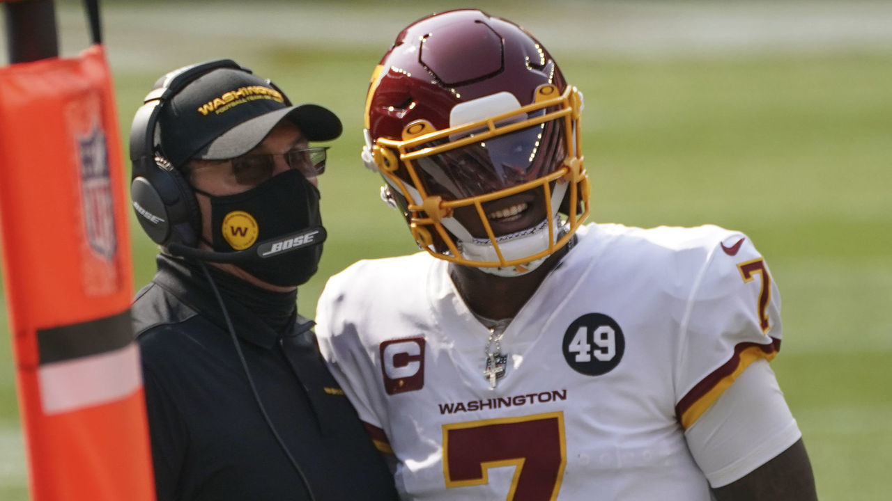 WASHINGTON, DC - SEPTEMBER 27: Washington Football Team head coach Ron Rivera and Washington Football Team quarterback Dwayne Haskins (7) watch a replay after the Cleveland Browns challenge a catch call the game between the Cleveland Browns and the Washington Football Team at FirstEnergy Stadium in Cleveland, Ohio on Sunday, September 27, 2020. The Cleveland Browns defeated the Washington Football Team 34-20.