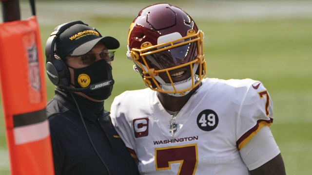 WASHINGTON, DC - SEPTEMBER 27: Washington Football Team head coach Ron Rivera and Washington Football Team quarterback Dwayne Haskins (7) watch a replay after the Cleveland Browns challenge a catch call the game between the Cleveland Browns and the Washington Football Team at FirstEnergy Stadium in Cleveland, Ohio on Sunday, September 27, 2020. The Cleveland Browns defeated the Washington Football Team 34-20.