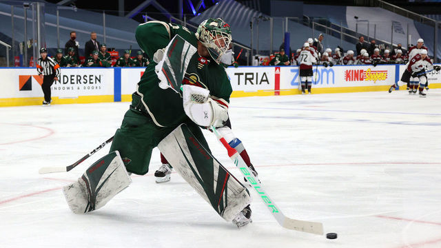 EDMONTON, ALBERTA - JULY 29: Goaltender Devan Dubnyk #40 of the Minnesota Wild plays the puck in the face-off circle during the third period of an exhibition game against the Colorado Avalanche prior to the 2020 NHL Stanley Cup Playoffs at Rogers Place on July 29, 2020 in Edmonton, Alberta.