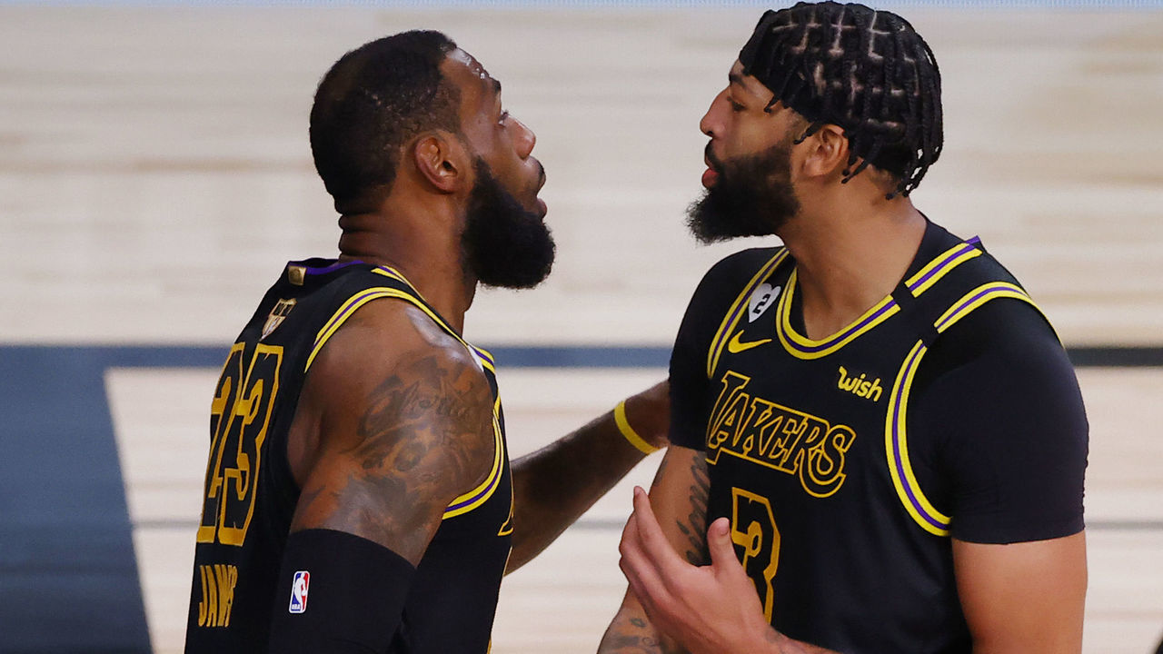 LAKE BUENA VISTA, FLORIDA - OCTOBER 02: LeBron James #23 and Anthony Davis #3 of the Los Angeles Lakers react during the first half against the Miami Heat in Game Two of the 2020 NBA Finals at AdventHealth Arena at ESPN Wide World Of Sports Complex on October 02, 2020 in Lake Buena Vista, Florida.