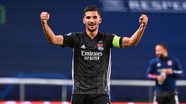 LISBON, PORTUGAL - AUGUST 15: Houssem Aouar of Olympique Lyon celebrates following his team's victory in the UEFA Champions League Quarter Final match between Manchester City and Lyon at Estadio Jose Alvalade on August 15, 2020 in Lisbon, Portugal.