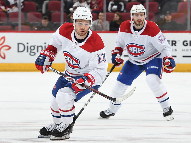 GLENDALE, AZ - DECEMBER 20: Max Domi #13 and Victor Mete #53 of the Montreal Canadiens skate up ice against the Arizona Coyotes at Gila River Arena on December 20, 2018 in Glendale, Arizona.
