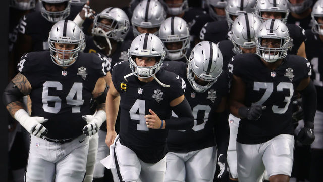 LAS VEGAS, NEVADA - SEPTEMBER 21: Quarterback Derek Carr #4 of the Las Vegas Raiders runs onto the field with teammates before the NFL game against the New Orleans Saints at Allegiant Stadium on September 21, 2020 in Las Vegas, Nevada.