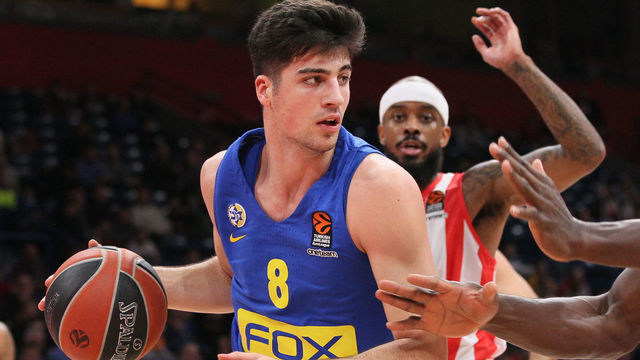 BELGRADE, SERBIA - MARCH 06: Deni Avdija, #8 of Maccabi Fox Tel Aviv competes with Michael Ojo, #50 of Crvena Zvezda mts Belgrade during the 2019/2020 Turkish Airlines EuroLeague Regular Season Round 28 match between Crvena Zvezda mts Belgrade and Maccabi Fox Tel Aviv at Stark Arena on March 06, 2020 in Belgrade, Serbia.