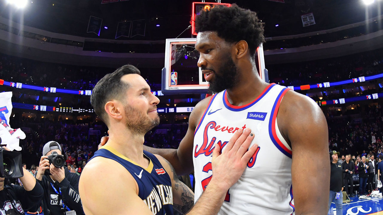 PHILADELPHIA, PA - DECEMBER 13: Joel Embiid #21 of the Philadelphia 76ers and JJ Redick #4 of the New Orleans Pelicans talk after a game on December 13, 2019 at the Wells Fargo Center in Philadelphia, Pennsylvania NOTE TO USER: User expressly acknowledges and agrees that, by downloading and/or using this Photograph, user is consenting to the terms and conditions of the Getty Images License Agreement. Mandatory Copyright Notice: Copyright 2019 NBAE