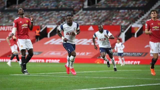 Tottenham Hotspur's Ivorian defender Serge Aurier celebrates scoring their fifth goal during the English Premier League football match between Manchester United and Tottenham Hotspur at Old Trafford in Manchester, north west England, on October 4, 2020.