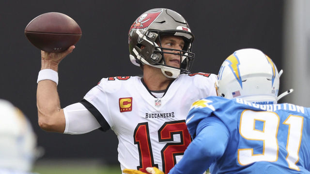 TAMPA, FLORIDA - OCTOBER 04: Tom Brady #12 of the Tampa Bay Buccaneers looks to pass during the first quarter of a game against the Los Angeles Chargers at Raymond James Stadium on October 04, 2020 in Tampa, Florida.