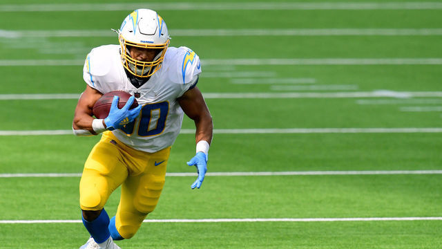 INGLEWOOD, CALIFORNIA - SEPTEMBER 27: Austin Ekeler #30 of the Los Angeles Chargers runs after his catch during a 21-16 Carolina Panthers win at SoFi Stadium on September 27, 2020 in Inglewood, California.