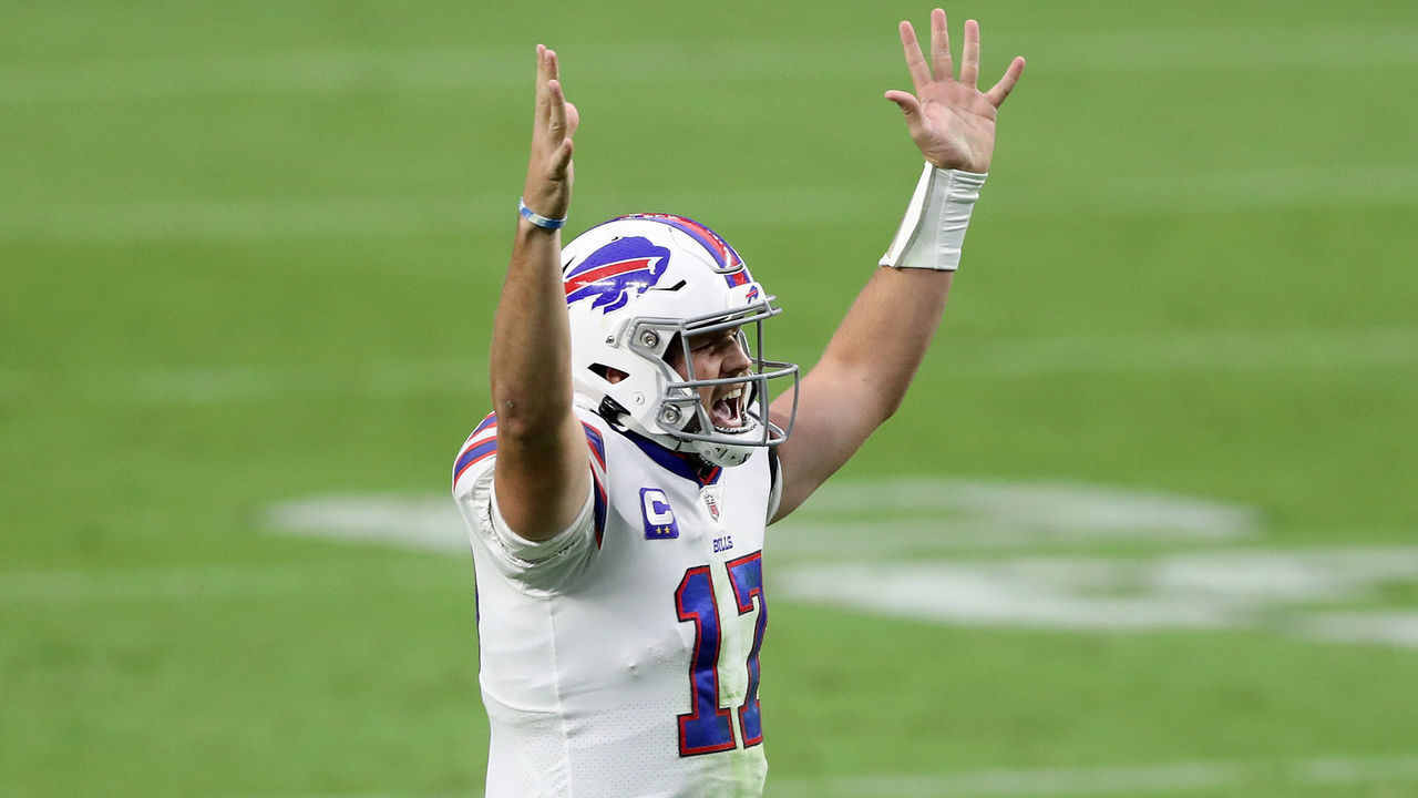 LAS VEGAS, NEVADA - OCTOBER 04: Josh Allen #17 of the Buffalo Bills celebrates after Devin Singletary #26 scored a two yard touchdown against the Las Vegas Raiders during the fourth quarter in the game at Allegiant Stadium on October 04, 2020 in Las Vegas, Nevada.